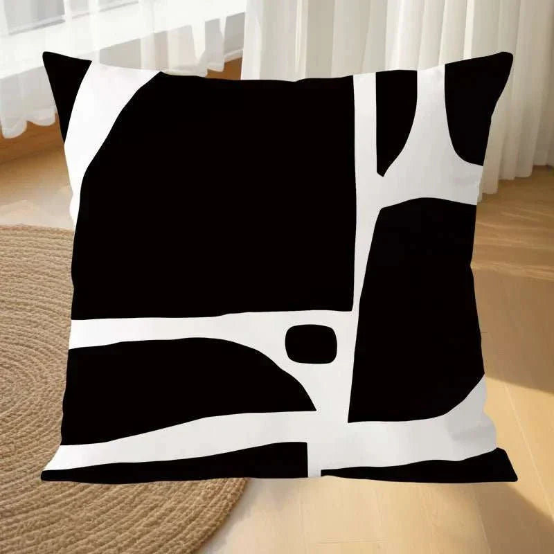 Black and white geometric pillowcase for modern decor.