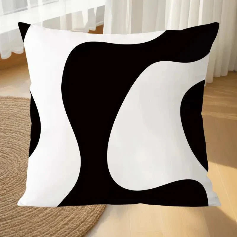 Geometric black and white pillowcase for modern decor.