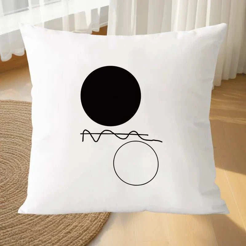 Geometric black and white pillowcase for modern decor.
