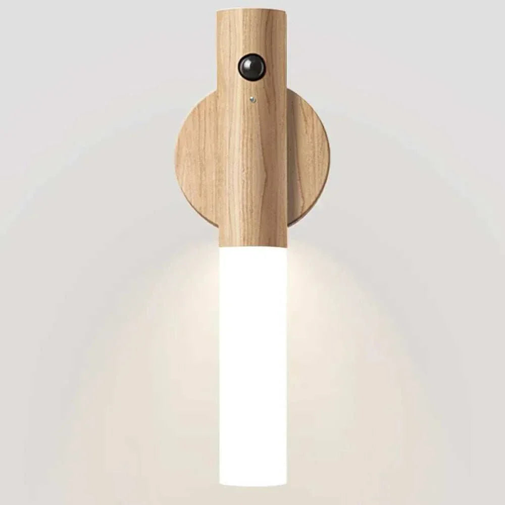 Rechargeable LED night light with motion sensor and wood finish.