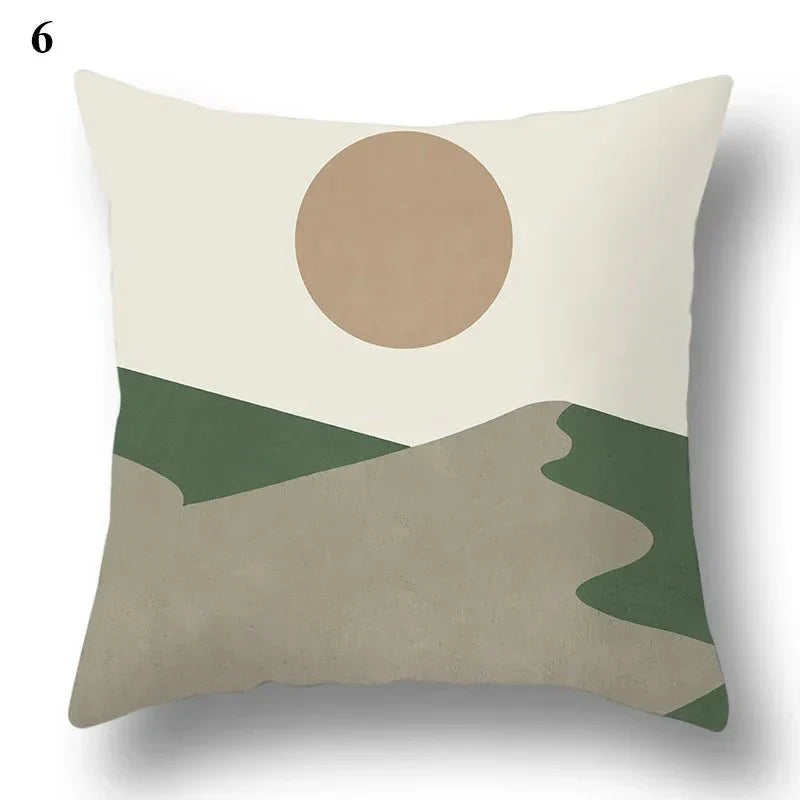 Green leaf and abstract design pillowcase on white background.