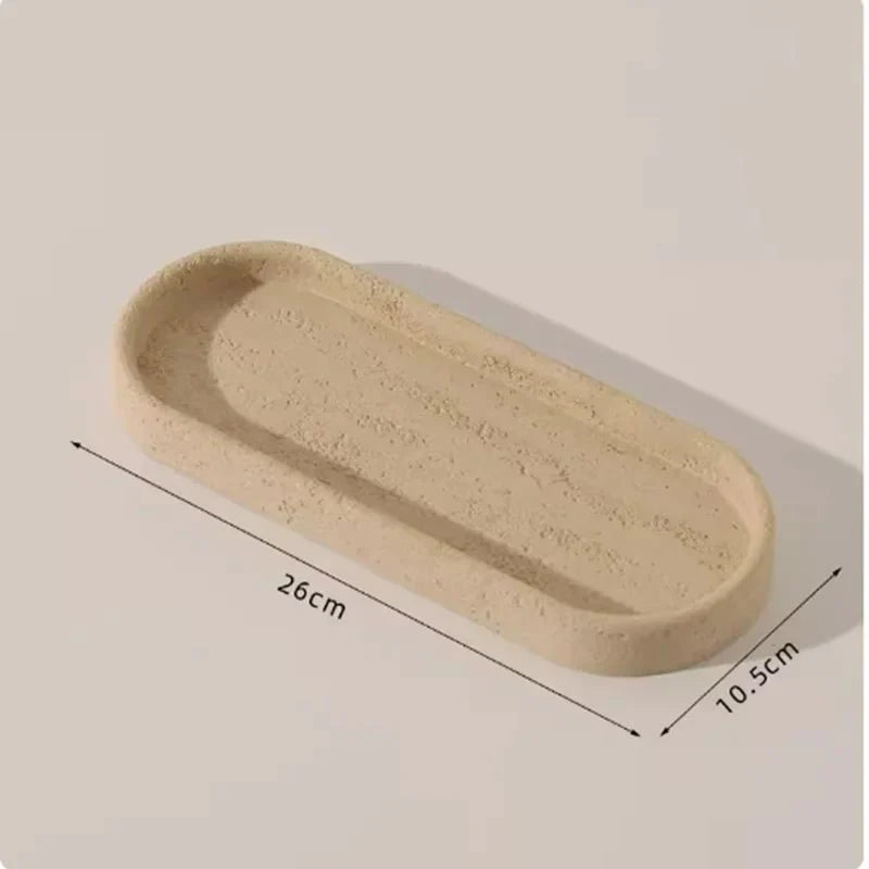 Bathroom organizer with stone effect design, measuring 26cm by 10.5cm, showcasing a raw, textural appearance.