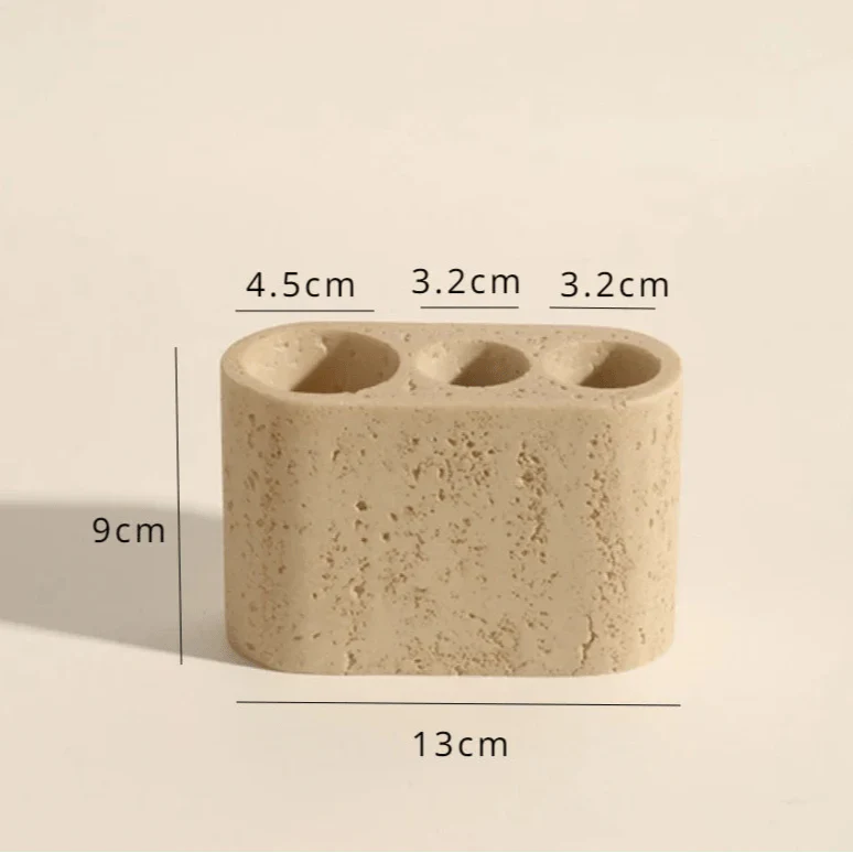 Stone effect bathroom organizer with three compartments, 13cm wide and 9cm tall.