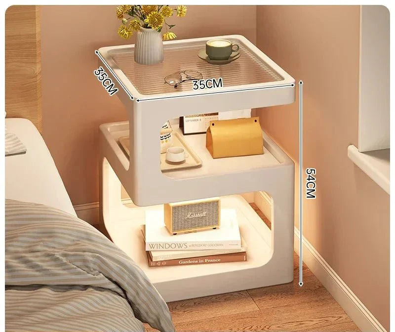 Minimalist wooden nightstand with LED lighting and open Z-shaped design featuring compartments and a slatted surface.