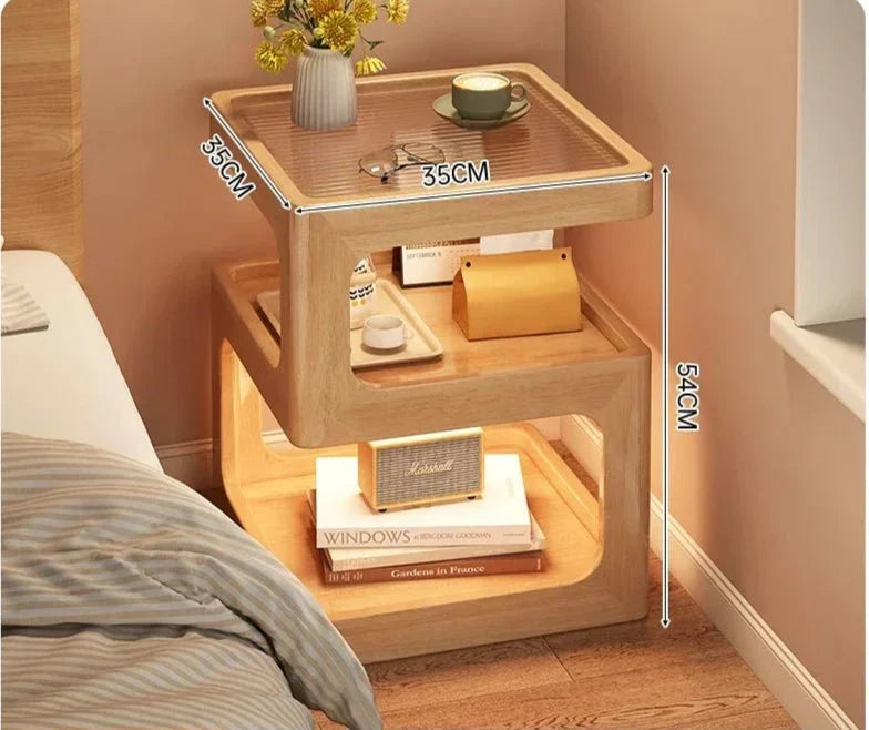Minimalist wooden nightstand with Z-shaped design and integrated lighting.