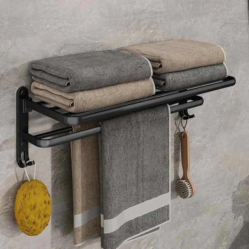 Wall-mounted towel rack with industrial design, matte black finish, and multiple storage levels for towels.