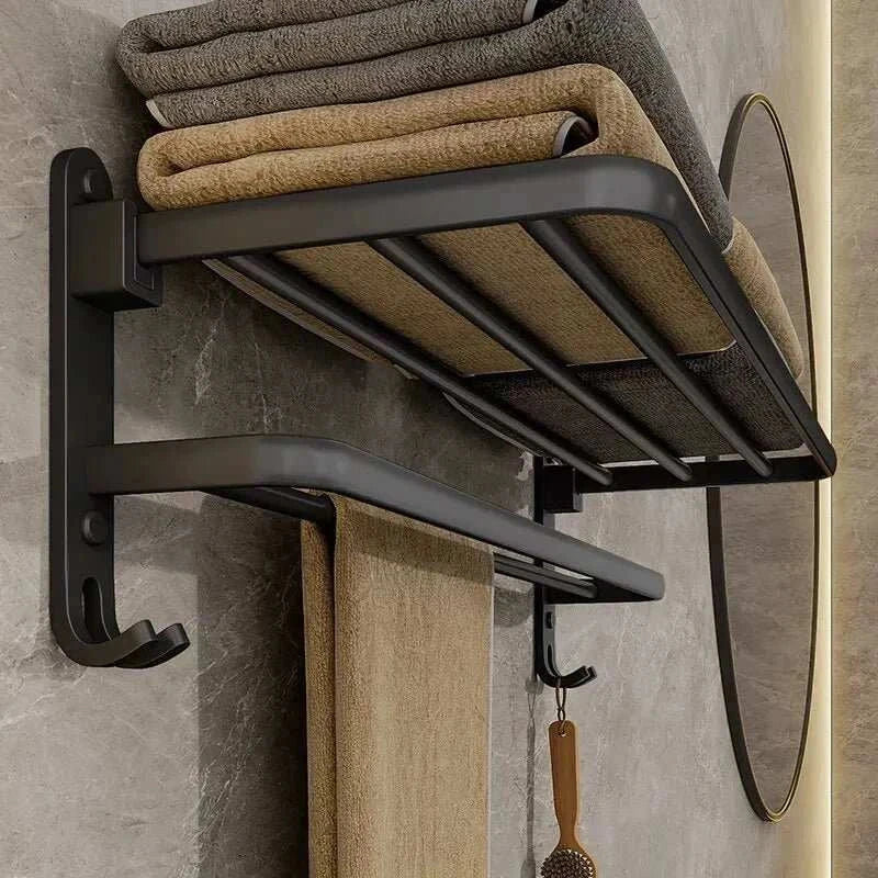 Wall-mounted matte black towel rack with multiple levels for storage, ideal for modern bathrooms.