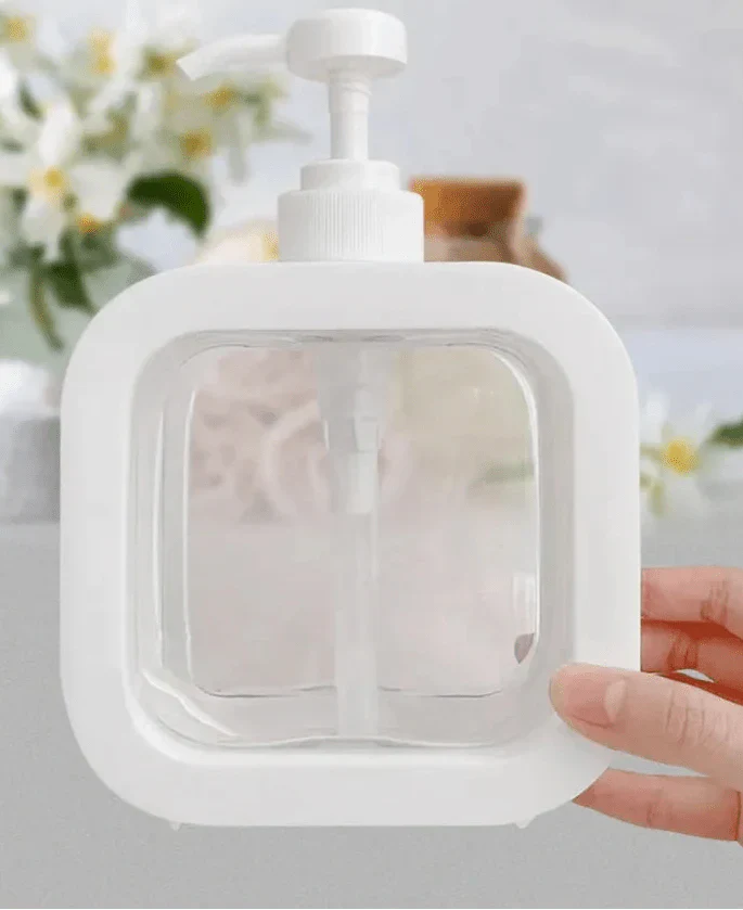 Modern matte soap dispenser with clear design and ergonomic swivel pump for easy use.