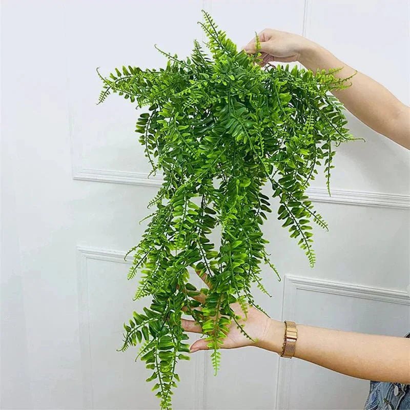 Lush faux hanging fern for indoor decor.