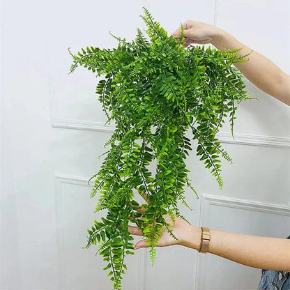 Lush faux hanging fern for indoor decor.