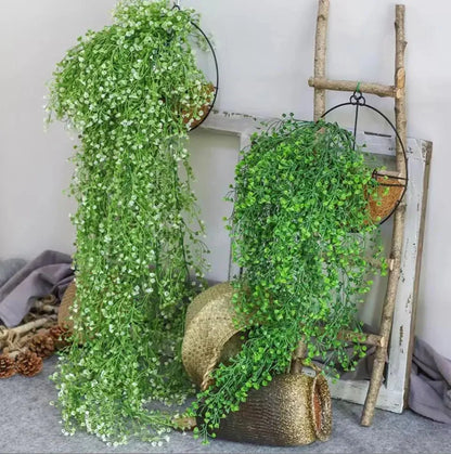 Hanging faux vine with colorful artificial willow plants, ideal for home decoration.
