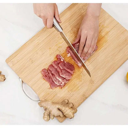 Natural bamboo cutting board with handle, showcasing durability and eco-friendly design, perfect for kitchen use.