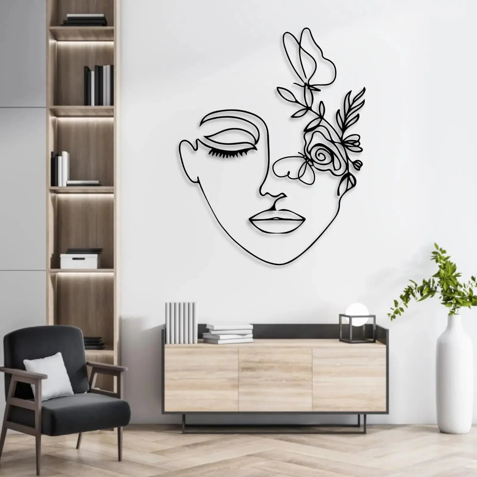 Botanical wall art mural featuring feminine profile in metal, adding modern elegance to interiors.