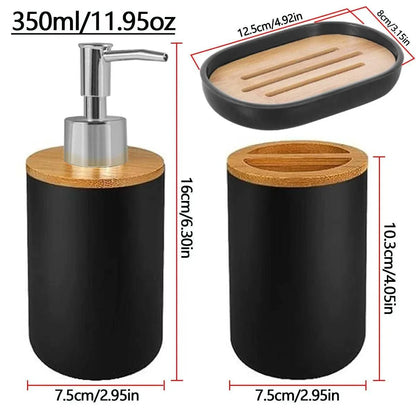 Matte ceramic soap dispenser set with cup and bamboo accents.