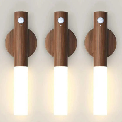 Rechargeable wall LED night light with motion sensor and wood finish.