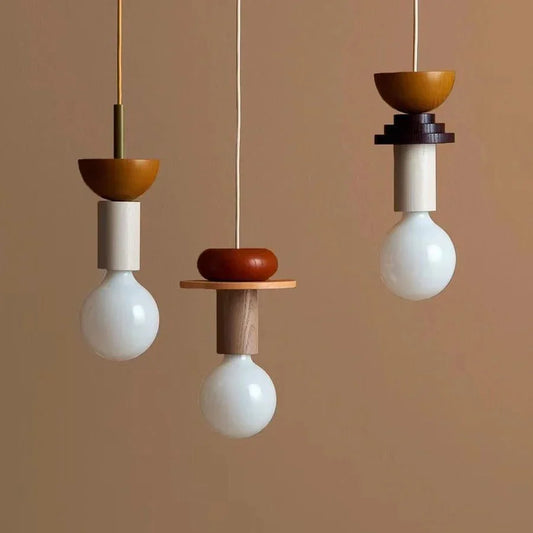 Colorful sculptural design of CADOT™ LED pendant lights with geometric shapes and playful colors.