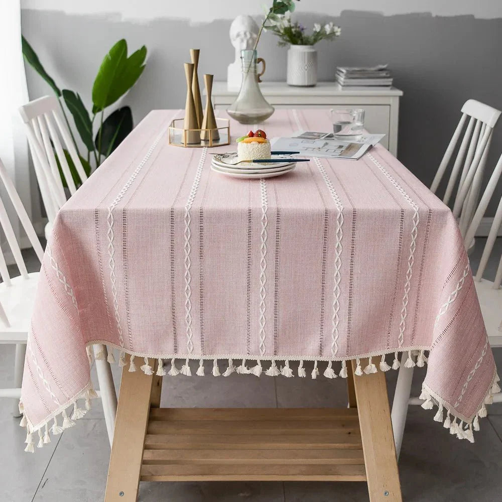 Soft linen-feel Centrarin tablecloth with tassel edge on dining table, enhancing a calm and natural ambiance.