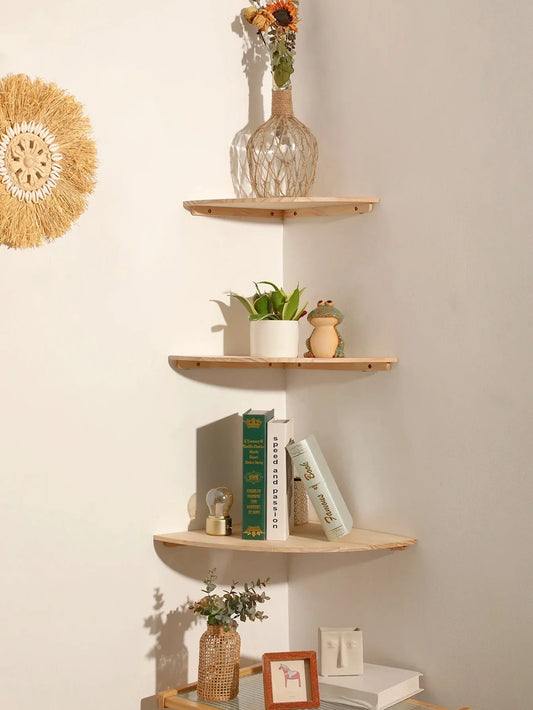 Wooden corner wall shelves set with decorative items displayed.