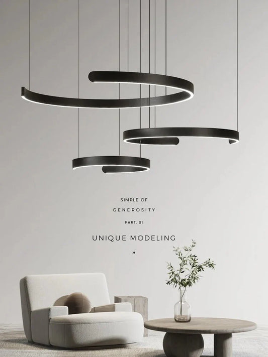 Minimalist geometric LED pendant light in modern style, featuring black and white semicircular rings, enhances ceiling aesthetics.