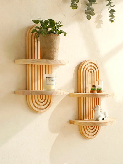 Boho style wooden oval wall shelves with natural wood finish, displaying plants and decor items.