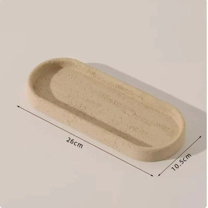 Bathroom organizer with stone effect design, measuring 26cm by 10.5cm, showcasing a raw, textural appearance.