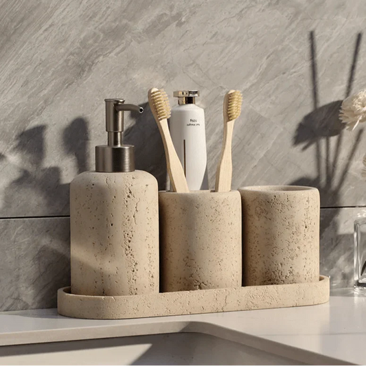 Stone effect LINCE™ bathroom organizer with toothbrush holders and pump dispenser.