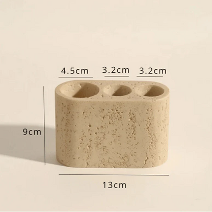 Stone effect bathroom organizer with three compartments, 13cm wide and 9cm tall.