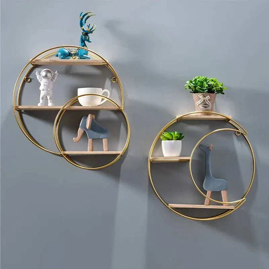 Hanging round wall shelf with metal circular design and decorative items.