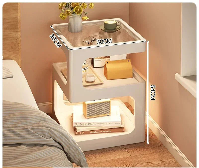 Minimalist wooden nightstand with sculptural Z-shape and integrated LED lighting.