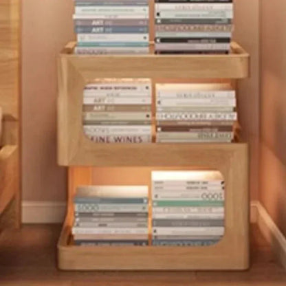 Minimalist wooden nightstand with books on sculptural Z-shaped shelves.