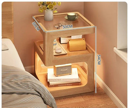 Minimalist wooden nightstand with Z-shaped design and drawer, featuring a ventilated top and ambient LED lighting.