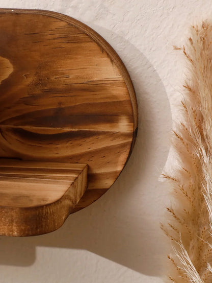 Oval floating wood shelf by MOONALUNA™ with natural grain pattern, ideal for wall decor.