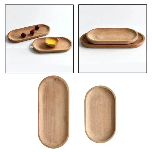 Oval wood serving tray set, featuring two natural platters by KUSARE™, ideal for displaying and serving.