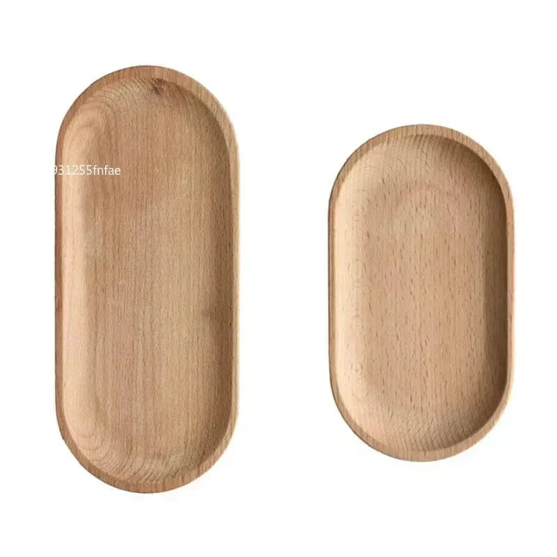 Oval wood serving tray set by KUSARE™ in natural finish.