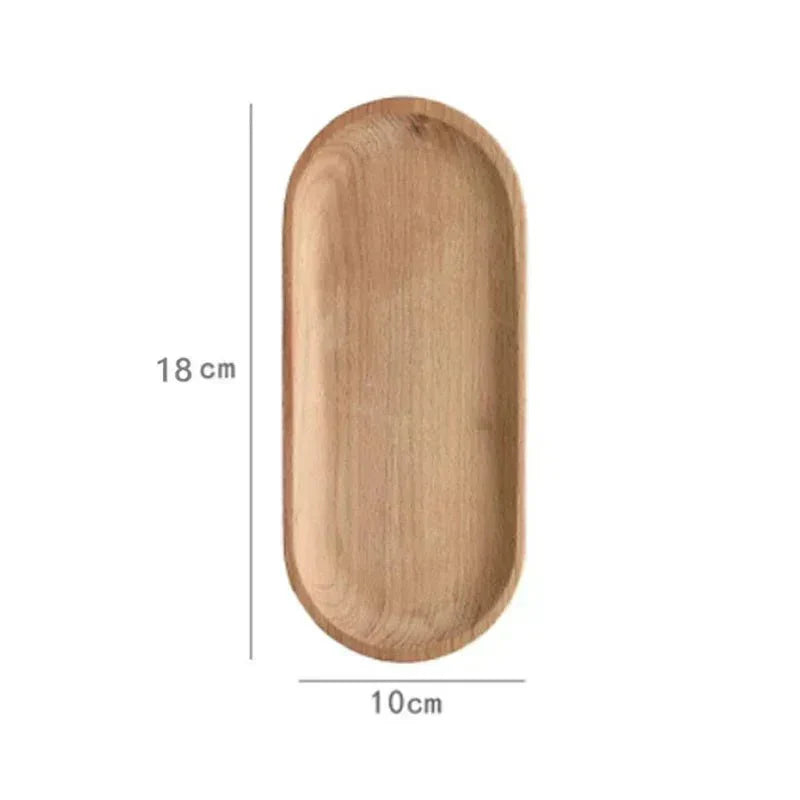 Oval wood serving tray by KUSARE™, a natural platter measuring 18 cm by 10 cm.