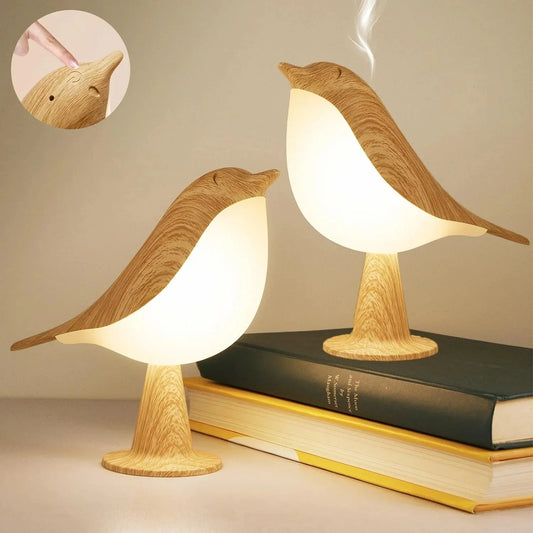 Bird-shaped diffuser lamp with aroma function, adjustable brightness, rechargeable, and essential oil compatibility.