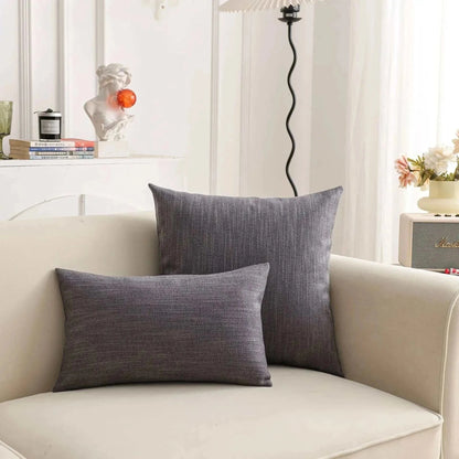Natural linen throw pillow covers on a sofa, showcasing a textured and earthy design for a calm, cozy interior.