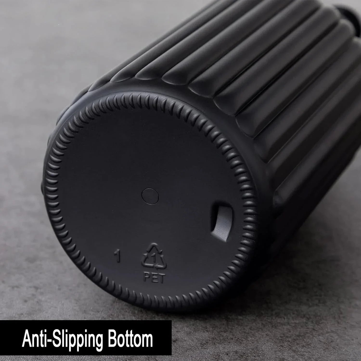 RIGO™ Bathroom Dispenser with anti-slipping ribbed bottom in matte black.