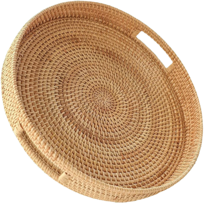 Round handwoven rattan serving tray with built-in side handles.