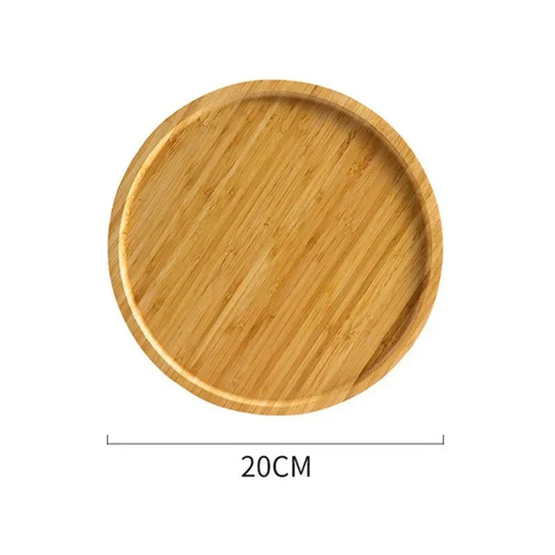 Round wooden serving tray with raised edge, 20cm diameter, natural grain.