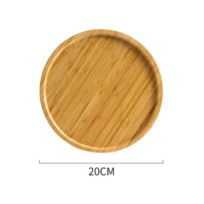 Round wooden serving tray with raised edge, 20cm diameter, natural grain.