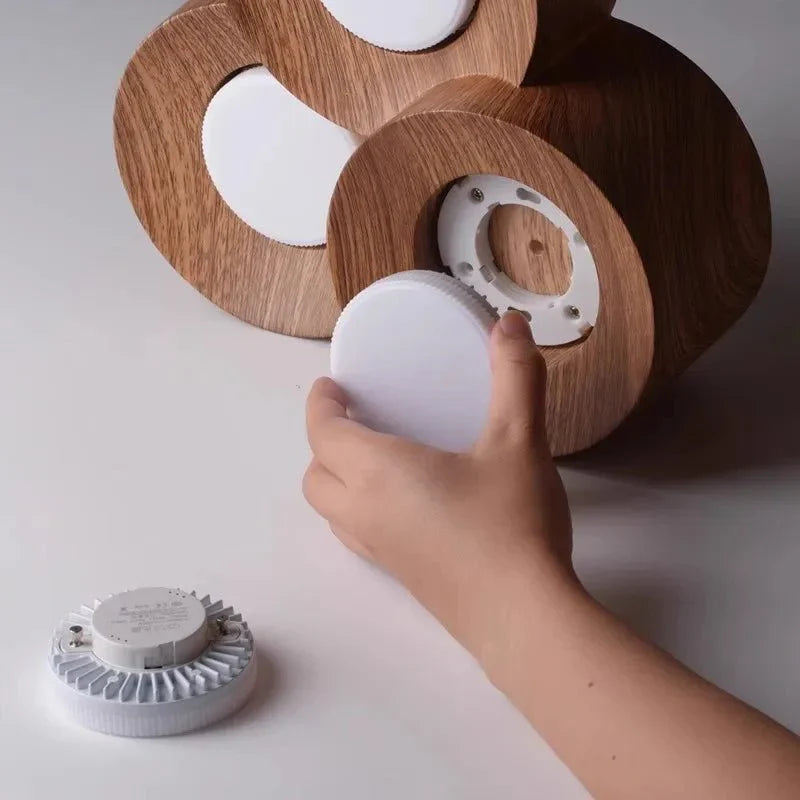 Surface-mounted walnut LED ceiling spotlights with dimmable function and eco-friendly materials.